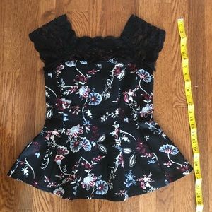 Stretchy Peplum top with lace on upper chest